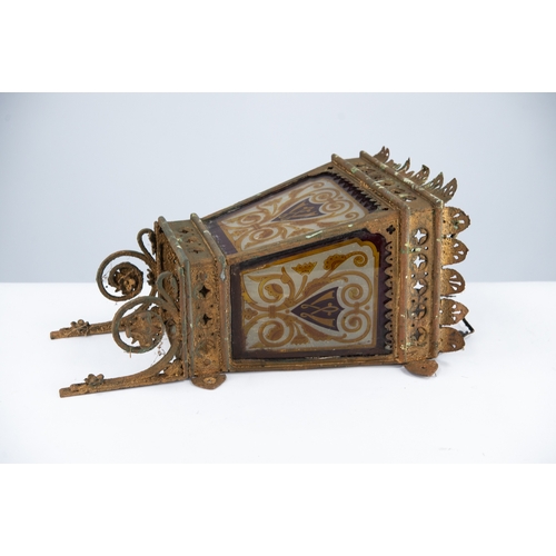 134 - LATE VICTORIAN PIERCED GILT METAL EXTERNAL WALL LIGHT, the three frosted panes printed and hand tint... 