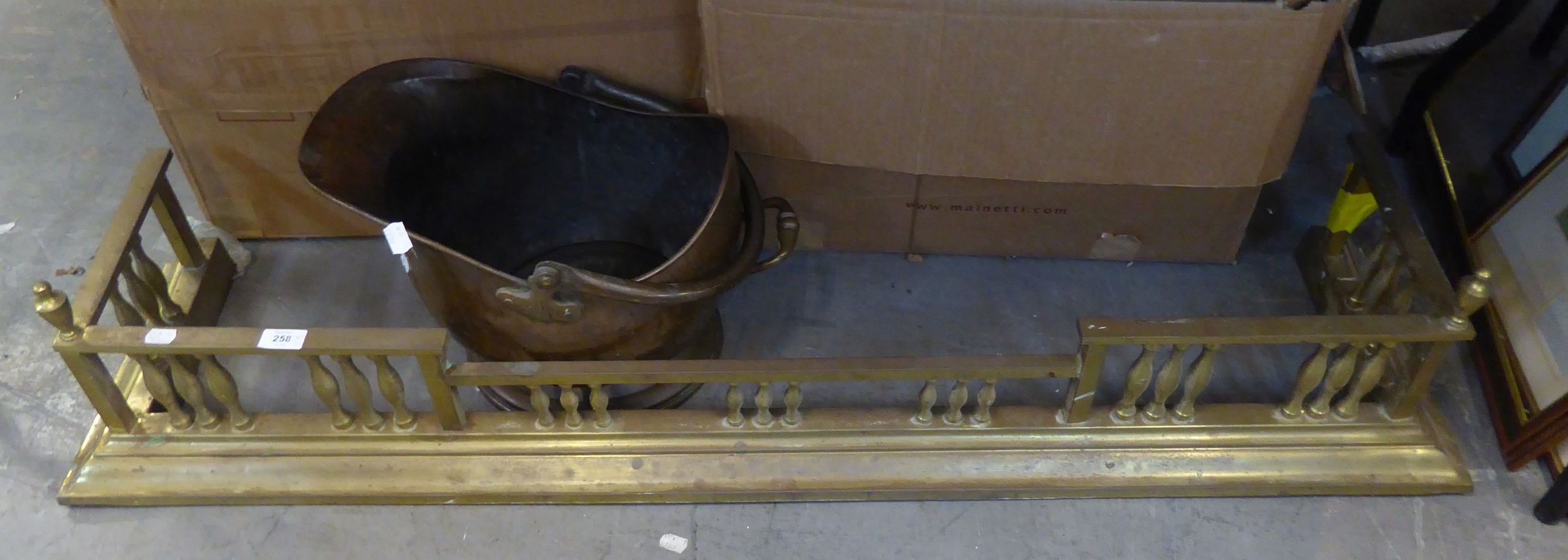 A BRASS FIRE FENDER WITH GALLERY, BALUSTER FRONT AND SIDES, TOGETHER ...