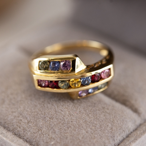 99 - 9ct GOLD RING with triple cross-over top channel set with various coloured precious stones, pair of ... 