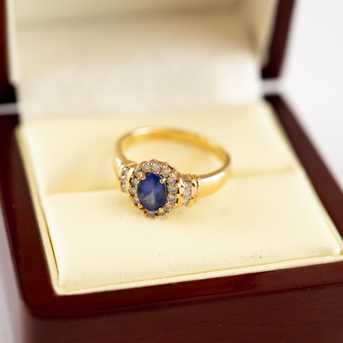 111 - 18ct GOLD, SAPPHIRE AND DIAMOND OVAL CLUSTER RING with centre oval synthetic sapphire and surround o... 