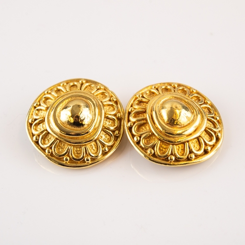 233 - CHRISTIAN DIOR, PAIR OF GOLD PLATED TARG SHAPED CLIP EARRINGS, 1 3/8in (3.5cm) diameter, signed, (2)