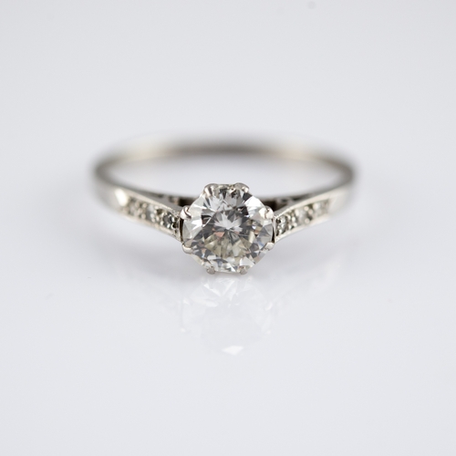 149 - PLATINUM RING, WITH A ROUND BRILLIANT CUT DIAMOND, in an eight claw setting, approximately .90ct, co... 