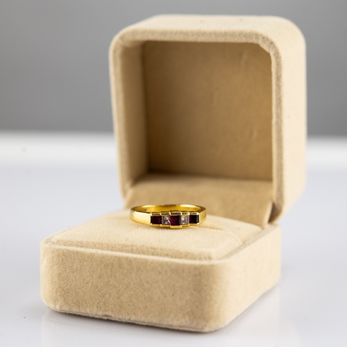 155 - 18ct GOLD RING, set with two baguette cut diamonds and three rectangular rubies, each diamond approx... 