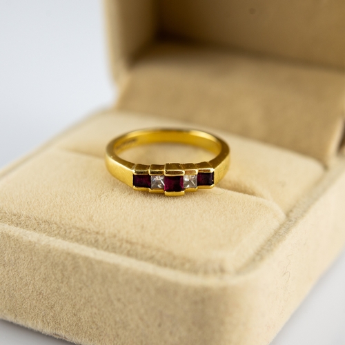 155 - 18ct GOLD RING, set with two baguette cut diamonds and three rectangular rubies, each diamond approx... 