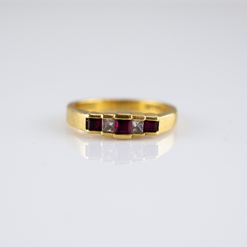 155 - 18ct GOLD RING, set with two baguette cut diamonds and three rectangular rubies, each diamond approx... 