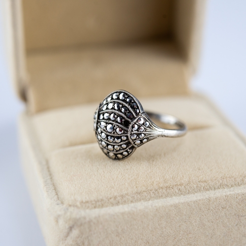 157 - SILVER AND MARCASITE ART DECO DOMED CLUSTER RING, Birmingham 1957, ring size O/P