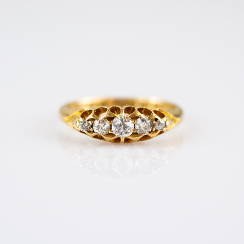 58 - VICTORIAN 18ct GOLD RING, with a lozenge shaped setting of five old cut diamonds graduating from the... 