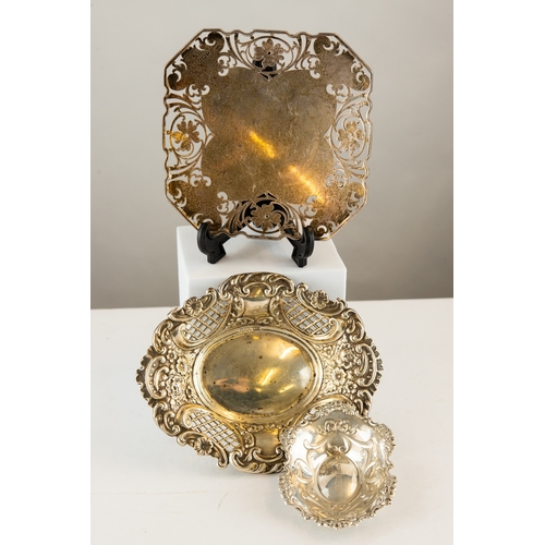 295 - THREE VICTORIAN AND LATER SILVER BON BON DISHES, comprising: TWO OF OVAL FORM AND FLORAL EMBOSSED, o... 