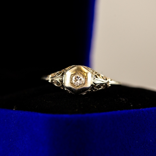 173 - 18ct GOLD RING collet set with an old cut solitaire diamond, approximately 0.12ct, 2.2gms, ring size... 