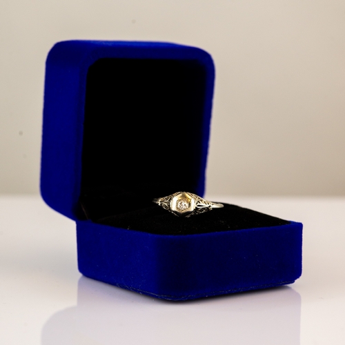 173 - 18ct GOLD RING collet set with an old cut solitaire diamond, approximately 0.12ct, 2.2gms, ring size... 