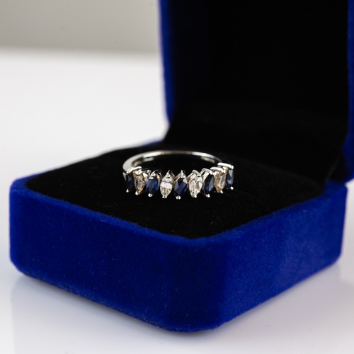 64 - 9ct WHITE GOLD RING set with five marquise cut blue sapphires, alternating with four marquise cut wh... 