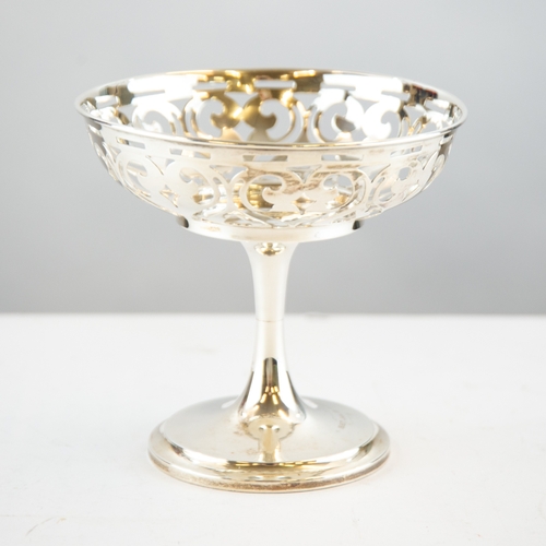 344 - GEORGE V PRESENTATION WEIGHTED SILVER PEDESTAL SWEET MEAT DISH, with pierced bowl, one line inscript... 