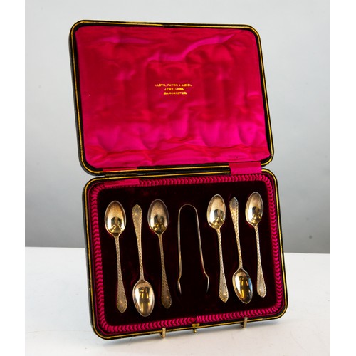 348 - GEORGE V CASED SET OF SIX SILVER TEASPOONS AND SUGAR TONGS, with bright cut borders, 3ozt, Sheffield... 