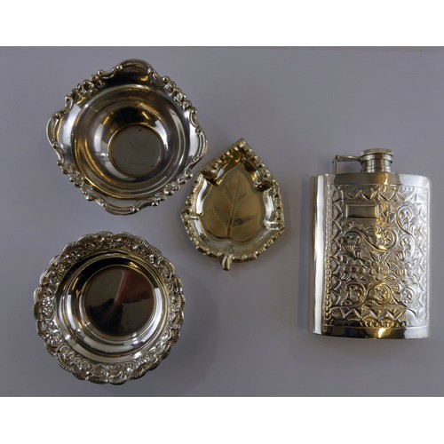 281A - FOUR PIECES OF FOREIGN SILVER COLOURED METAL, comprising: EMBOSSED HIP FLASK and TWO SMALL DISHES an... 