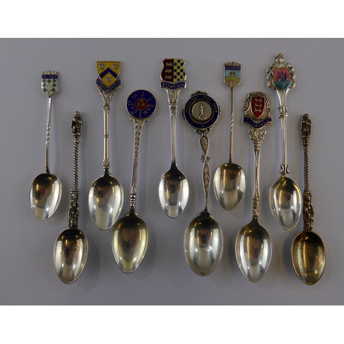 302 - SEVEN SILVER TEASPOONS WITH ENAMEL TOPS, together with a STERLING SILVER EXAMPLE FOR DAVENPORT GOLF ... 