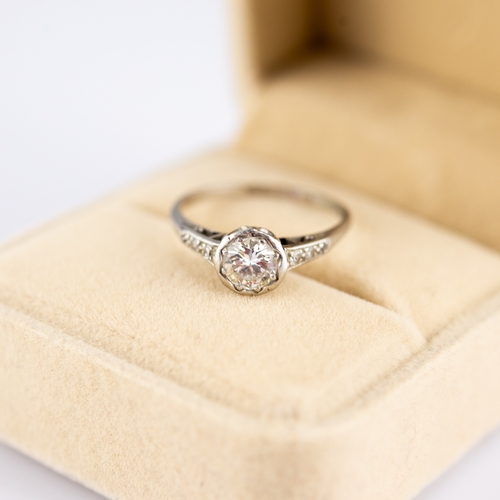 149 - PLATINUM RING, WITH A ROUND BRILLIANT CUT SOLITAIRE DIAMOND in a rubbed setting, approximately .60ct... 