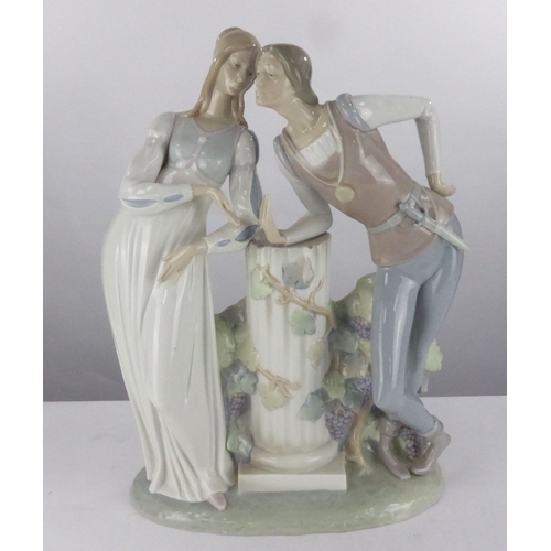 74 - LARGE LLADRO PORCELAIN GROUP, modelled as a maid and her suitor, standing either side of a fluted pa... 