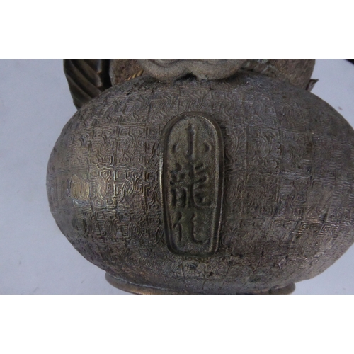 94 - ORIENTAL BRONZE JAR AND COVER, of double gourd form with fixed handle to the rear and similar cast f... 