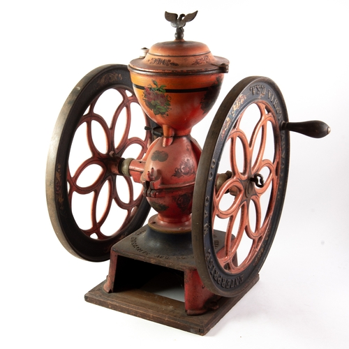 675 - COFFEE GRINDER: A 19th Century American double fly wheel coffee grinder by Enterprise MFG Co Philade... 