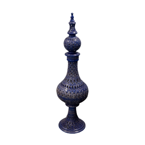 72 - MODERN MOROCCAN BLUE GLAZED AND PIERCED POTTERY VASE WITH STAND AND COVER, 47 ½” (120.6cm) high