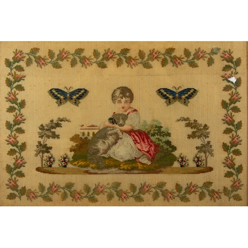 682 - VICTORIAN WOOLWORK PICTURE, girl and dog in a garden setting and flanked by two butterflies, all wit... 