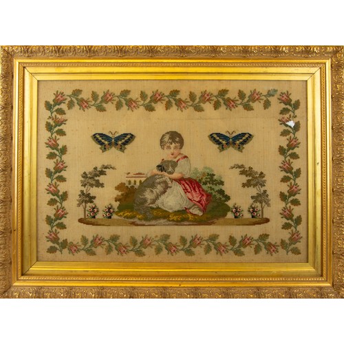 682 - VICTORIAN WOOLWORK PICTURE, girl and dog in a garden setting and flanked by two butterflies, all wit... 