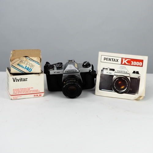 62 - ASAHI PENTAX K1000 SLR ROLL FILM CAMERA, with SMC PENTAX-A f1.7, 50mm lens, in a soft black carrying... 