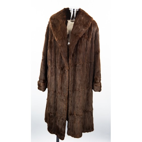 300 - LADY'S BROWN DYED ERMINE FULL-LENGTH FUR COAT with shawl collar, double breasted hook-fastening fron... 