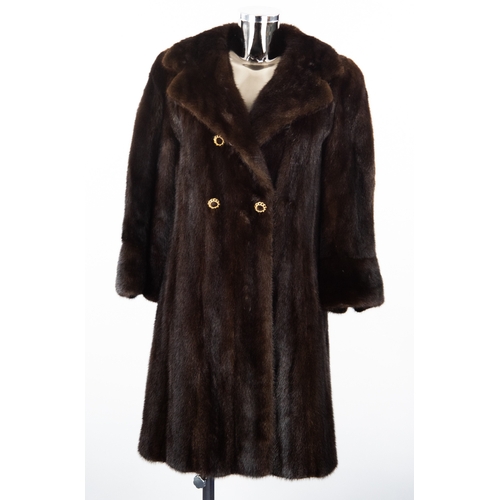 301 - DARK BROWN THREE-QUARTER LENGTH FUR COAT with broad, revered collar, double breasted two button fron... 