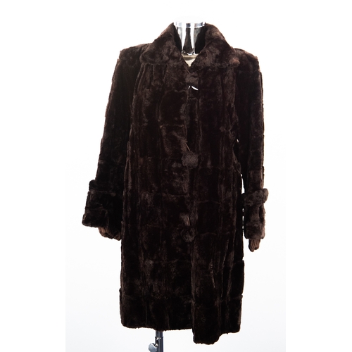 302 - LABELLED 'SCOTCH MOLE - BRITISH MADE' DARK BROWN FULL LENGTH FUR COAT with single breasted three but... 