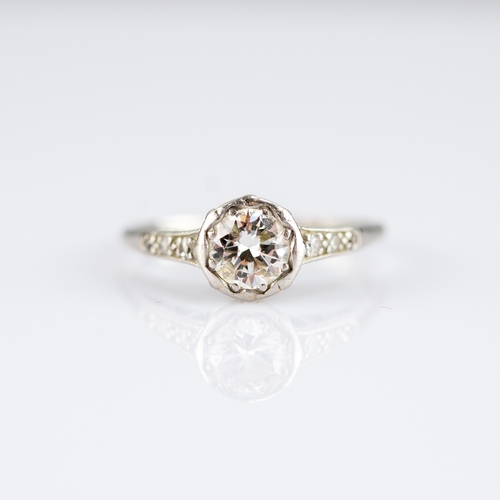 60 - PLATINUM RING, WITH A ROUND BRILLIANT CUT SOLITAIRE DIAMOND in a rubbed setting, approximately .60ct... 