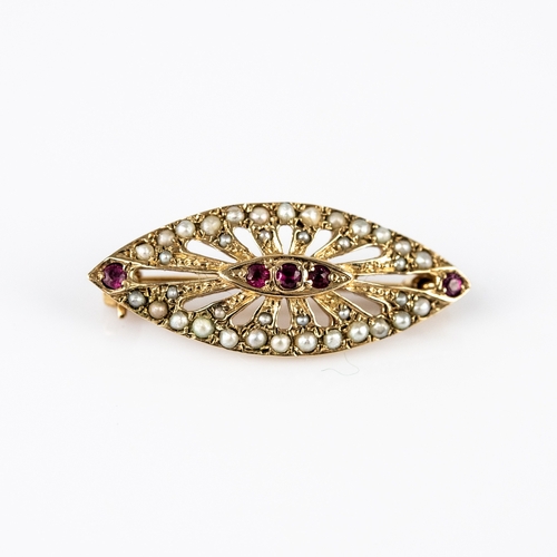 28 - 9ct GOLD LOZENGE SHAPED OPEN WORK BROOCH with centre lozenge shaped setting of three tiny rubies, a ... 