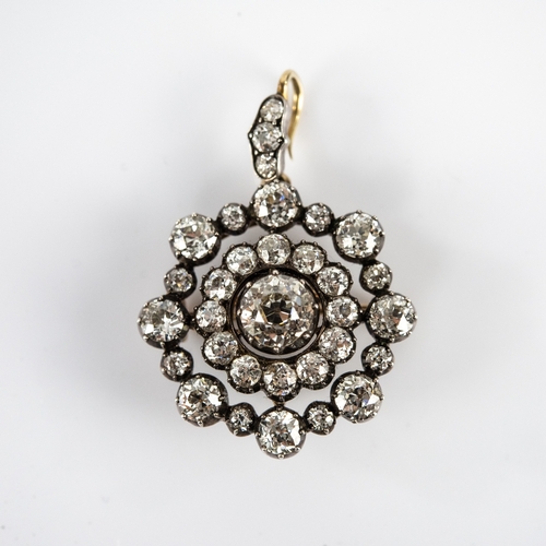 50 - EARLY VICTORIAN DIAMOND TARG BROOCH/PENDANT in three tiers, the centre round old cut diamond approxi... 