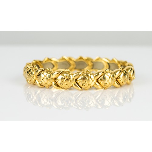 49 - 18ct GOLD SPRUNG BANGLE with fifteen fish pattern links, the top five links set with tiny diamonds, ... 