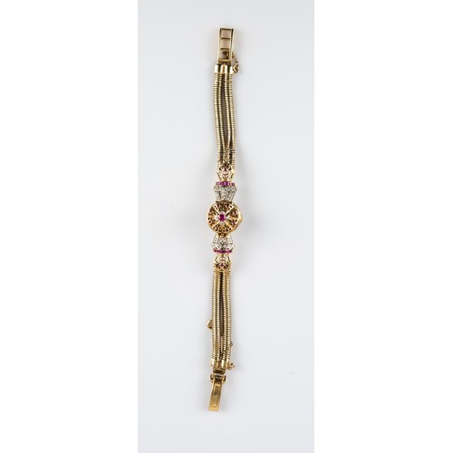 23 - JAEGER-LECOULTRE LADY'S SWISS 9ct GOLD DIAMOND RUBY SET BRACELET WATCH with mechanical movement, the... 