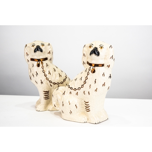 83 - PAIR OF 'KENT' STAFFORDSHIRE POTTERY 20TH CENTURY MANTEL DOGS with painted features and copper lustr... 