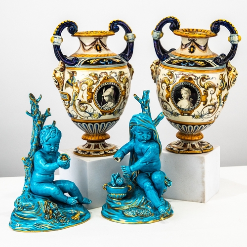 90 - TWO NINETEENTH CENTURY FRENCH PORCELAIN TURQUOISE GLAZED and GILT PUTTO FIGURES emblematic of WINTER... 