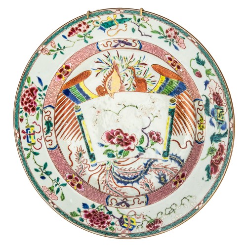 115 - LARGE CHINESE QING DYNASTY PORCELAIN FAMILLE ROSE SHALLOW DISH, the centre with a PHOENIX exhibiting... 