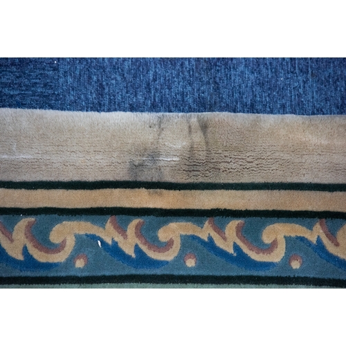 6 - LARGE WASHED CHINESE CARPET of Aubusson design, having large floral centre oval medallion, spandrels... 