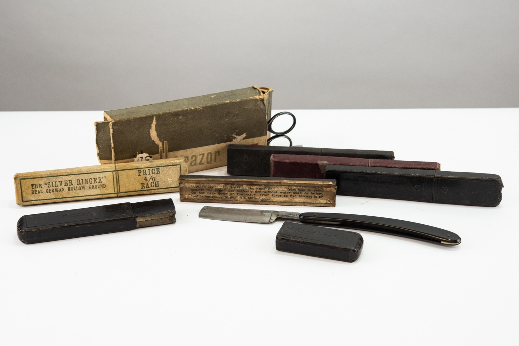 FOUR LATE 19th/EARLY 20th CENTURY STRAIGHT EDGE/CUT-THROAT RAZORS, EACH ...
