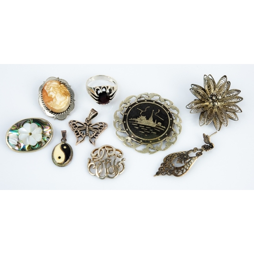 156 - 925 MARK SILVER OPENWORK BUTTERFLY PENDANT; indistinctly hallmarked GENT'S SILVER RING claw set with... 