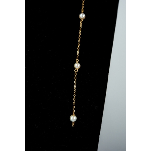 59 - 9ct GOLD FINE CHAIN NECKLACE set with nine small pearls at intervals, ring clasp (chain broken), 2gm...