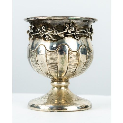 165 - CHASED STERLING SILVER MINIATURE PEDESTAL URN, of typical form, applied with a girdle of flowers, 2 ... 