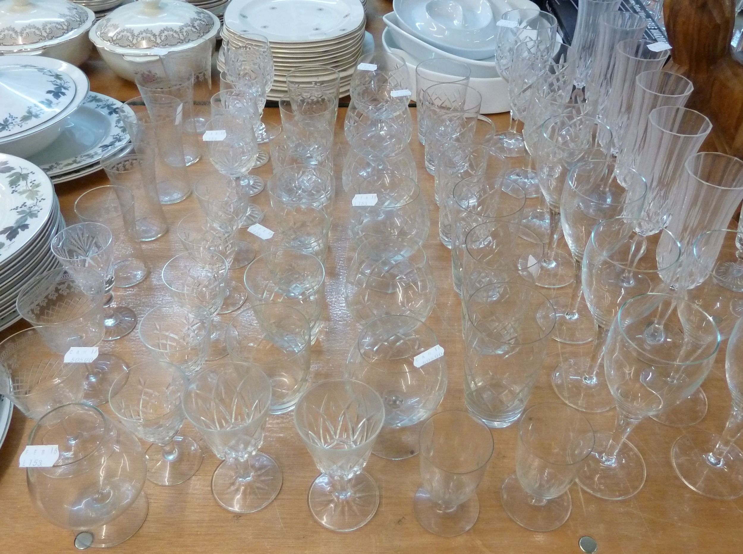 A GOOD SELECTION OF CUT GLASS DRINKING GLASSES, STEM WINES, WHISKY ...