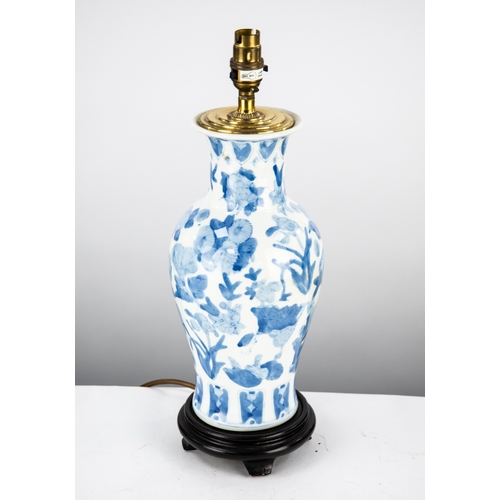 65 - MODERN PAIR OF CHINESE BLUE AND WHITE PORCELAIN VASE PATTERN TABLE LAMPS, on turned and ebonised bas... 