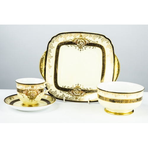 63 - FORTY PIECE MEITO, JAPANESE FINE CHINA TEASET FOR TWELVE PERSONS, decorated in black and gilt, with ... 
