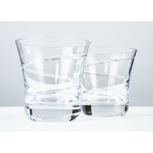 101 - LOUISE KENNEDY, SET OF NINE STYLISH WHISKY TUMBLERS, of slightly flared form with spiral cut bowls a... 