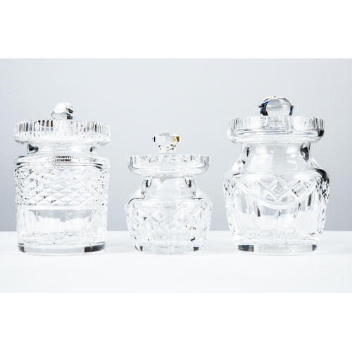 96 - THREE WATERFORD CUT GLASS PRESERVE JARS AND COVERS, 5” (12.7cm) high and smaller, stencilled marks, ... 