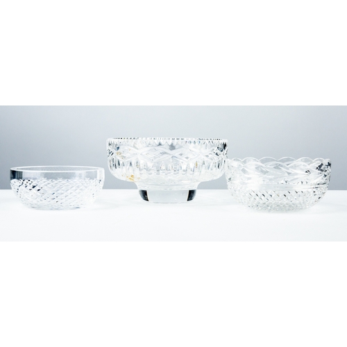 91 - THREE IRISH CUT GLASS BOWLS, comprising: a FOOTED, STEEP SIDED example by CAVAN, 4” (10.2cm) high, 7... 