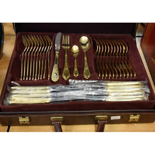 A BESTECKE SOLINGEN CUTLERY SET, IN FITTED CASE, 70 PIECES, 23/24 KARAT ...
